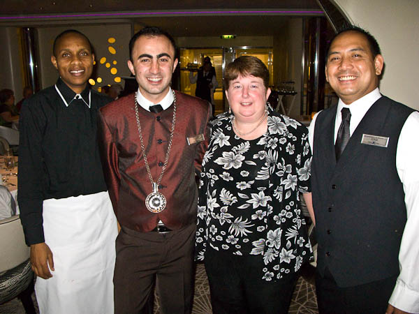 Assistant Waiter Rupert, Wine Steward Birol Koch and Waiter Ben Ronquillo aboard Celebrity Solstice
